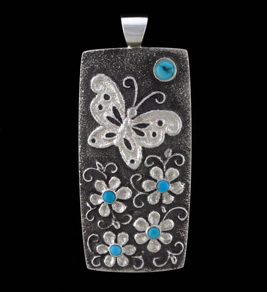 Pendentif Papillon en Tuf avec Fleurs