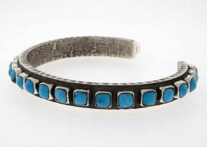 Natürlicher Kingman-Turquoise 26-Steine-Reihenarmband