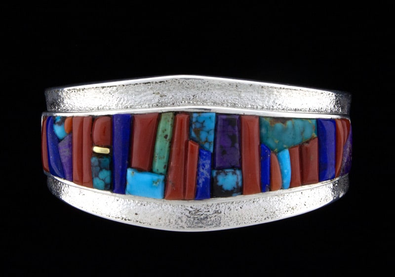 Bracelet en tufe avec un design en mosaïque de pavés surélevés multicolores